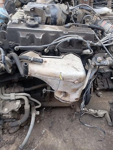 мото зарядка: Бензиновый мотор Mazda 2.2 л — 2