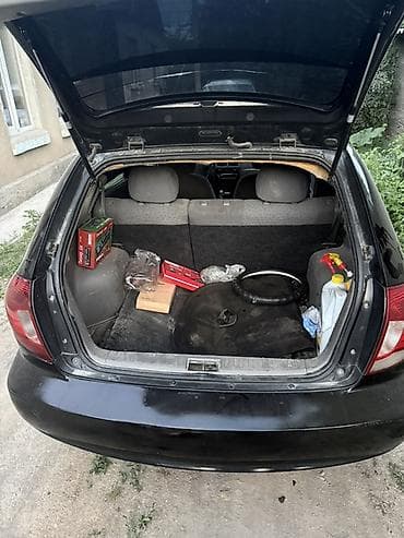 кузов калак: Kia Rio: 2003 г., Автомат, Бензин, Хэтчбэк — 5