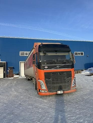 Грузоперевозки тентованной фурой Volvo 115 кубовый шторка длина
