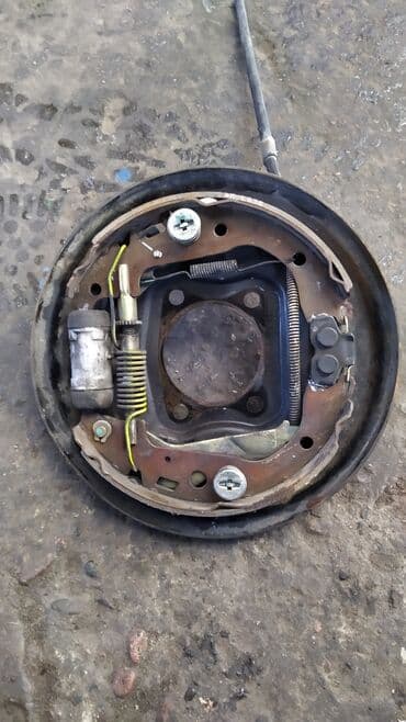 система форсунок: Toyota Funcargo колодки ручника, Тойота Фанкарго механизм заднего — 2