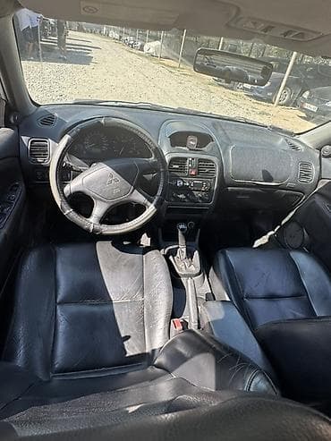 mc 2000: Mitsubishi Carisma: 2003 г., 1.8 л, Механика, Бензин, Седан — 2