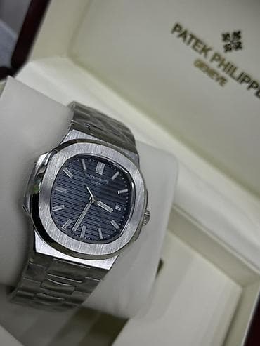 Часы Patek Philippe Nautilus - Корпус и браслет из нержавеющей стали — 1