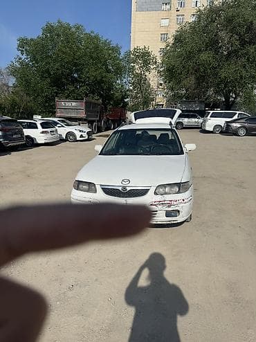 шагыл сокулук: Mazda 626: 2000 г., 2 л, Кол менен иштөөчү, Газ, Универсал — 2