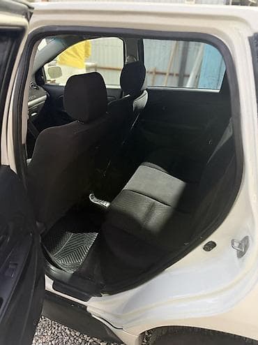 руль левый: Toyota Ist: 2004 г., 1.5 л, Автомат, Бензин, Фастбек — 3