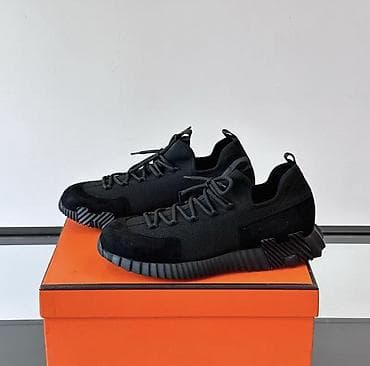 Прокат одежды: Кроссовки с выраженной подошвой и контрастной отделкой - Дизайн — 5