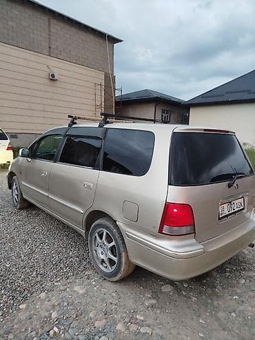 одесей: Honda Odyssey: 1999 г., Газ — 3