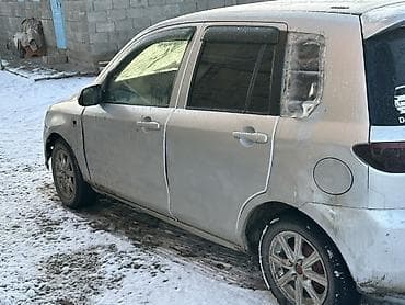 Mazda Demio: 2002 г., 1.5 л, Автомат, Бензин, Хэтчбэк