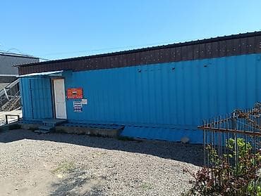 с гаража: Переоборудованный морской контейнер под модульное помещение в городе — 3