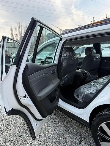 GAC: Aion – компактный электрический кроссовер белого цвета. Gac Aion I60 — 8