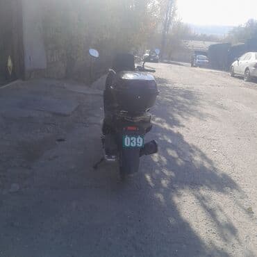 Скутер WANGYA, черный Характеристики и особенности: - Панель приборов — 2