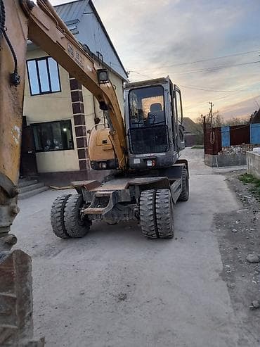 Колесный экскаватор JG (Jingong), компактного класса. Основные