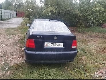 mini cuper: Volkswagen Polo: 1998 г., 1.4 л, Механика, Бензин, Хэтчбэк — 6