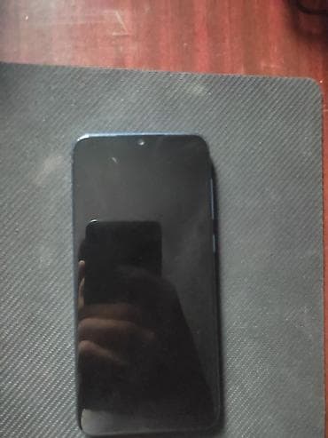 телефон 9с: Xiaomi, Mi 9 SE, Б/у, 128 ГБ, цвет - Синий, 2 SIM — 1