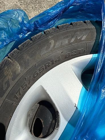 Зимние шины Goform Winter на штампованных дисках с колпаками Honda. - — 1