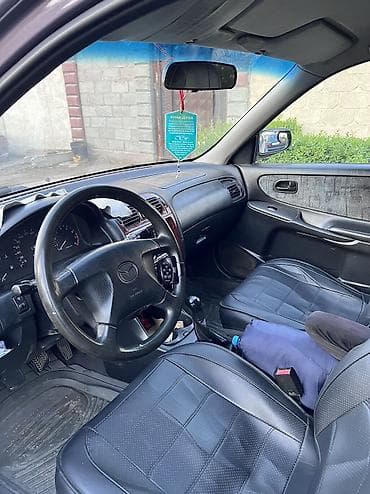 Продажа авто: Mazda Capella: 1998 г., 2 л, Механика, Бензин, Универсал — 5