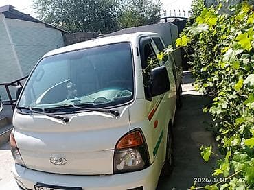 mini v: Hyundai Porter II, бортовой грузовик с тентом. Компактный — 1
