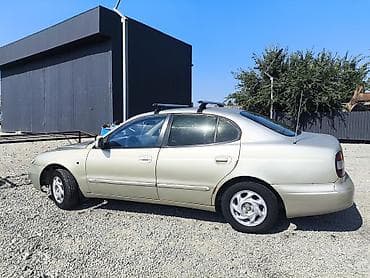 Транспорт: Daewoo Leganza: 1998 г., 1.8 л, Седан — 2