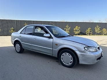 Mazda 323: 2002 г., 1.6 л, Механика, Бензин, Седан