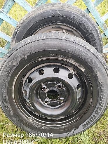 Шиналар жана дисктер: Стальные диски R14 с шинами 185/70 R14. Характеристики: - Диаметр — 2