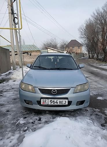 Mazda 323: 2002 г., Хэтчбэк