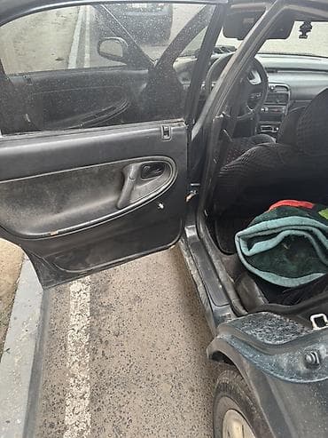 Mazda 626: 1995 г., 1.8 л, Механика, Бензин — 7