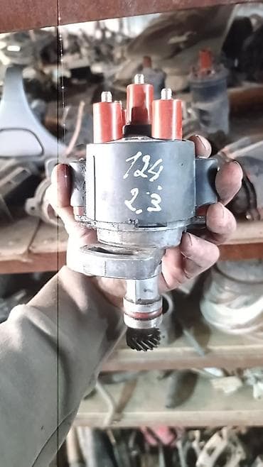 Трамблёр (распределитель зажигания) для бензинового двигателя 2.3. -