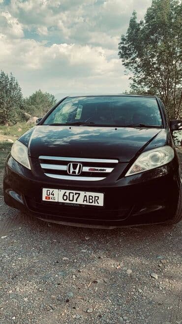 купить литые диски r14: Автомобиль Honda Edix, оснащенный литыми дисками с пятью спицами и — 8