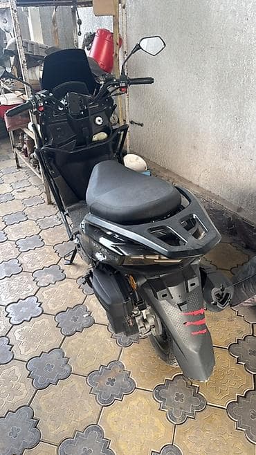 кроссовый мото: Скутер DUL DUL (класс 125/150 см³, вариатор) - Современный городской — 4