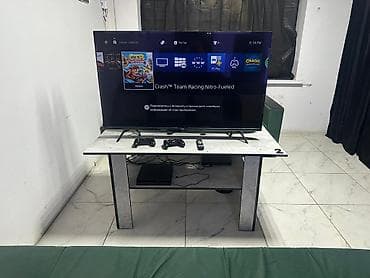 ps 1: Игровая зона с телевизором и PlayStation 4 телевизор 55 дюйм 4 диван 2 — 2