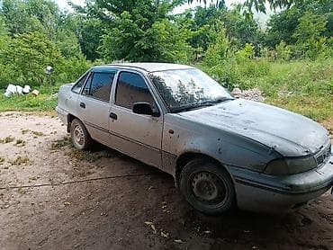 бензиновый мотороллер: Daewoo Nexia: 2005 г., 1.5 л, Механика, Бензин, Седан — 2