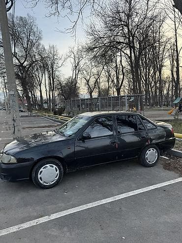 2011: Daewoo Nexia: 2011 г., Механика, Седан — 3