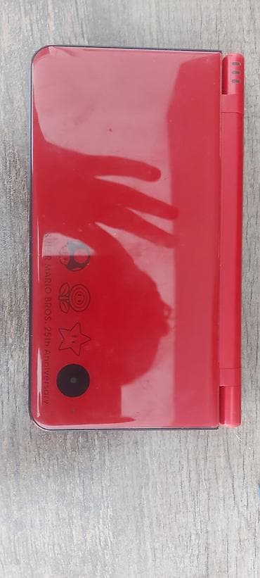 amazon kindle paperwhite: Nintendo DSi XL Limited Edition — Super Mario Bros. 25th Anniversary — 2