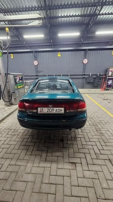 Продажа авто: Mazda 626: 1993 г., 2 л, Механика, Бензин, Хэтчбэк — 7