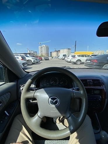 su 7: Mazda Capella: 2000 г., 2 л, Ручные, Бензин, Универсал — 9