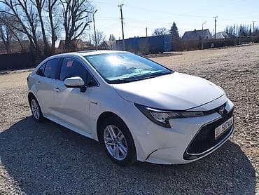 Toyota Corolla: 2019 г., 1.8 л, Автомат, Гибрид, Седан
