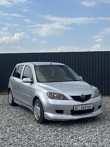 Mazda Demio: 2004 г., 1.3 л, Автомат, Газ, Хэтчбэк — 1