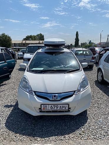 colf 2: Honda Fit: 2012 г., 1.3 л, Вариатор, Гибрид, Хэтчбэк — 2