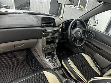 diska 14: Subaru Forester: 2002 г., 2 л, Автомат, Бензин, Кроссовер — 7