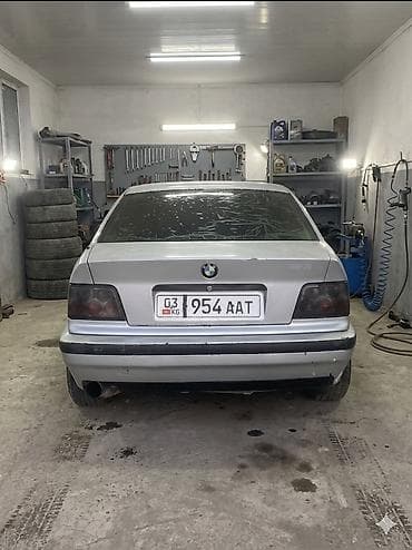 ун басандаткыч: BMW 3 series: 1990 г., 1.8 л, Кол менен иштөөчү, Бензин, Седан — 3