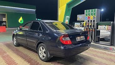 Toyota Camry: 2003 г., 2.4 л, Автомат, Газ, Седан