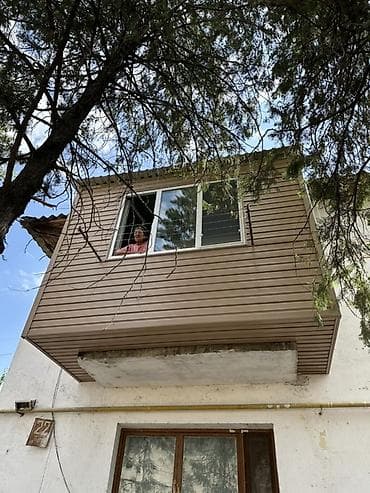 Обшивка и остекление балкона под ключ - Наружная отделка сайдингом