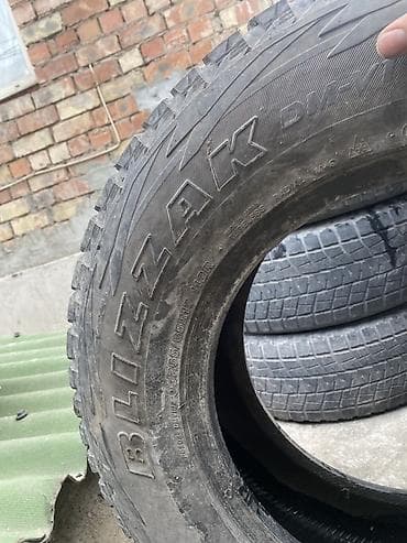 бир: Шиналар 265 / 65 / R 17, Кыш, Комплект, Жол тандабастар (АТ/МТ), Bridgestone — 2