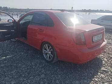 Унаа: Chevrolet Lacetti: 2006 г., 1.4 л, Кол менен иштөөчү, Газ, Седан — 7