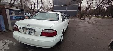 lada largus: Mazda 626: 2000 г., Механика, Седан — 6