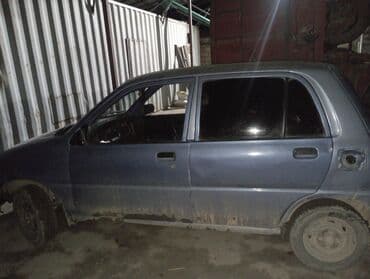 авто аристо: Daihatsu Cuore: 1995 г., 0.8 л, Механика, Бензин, Хетчбек — 2