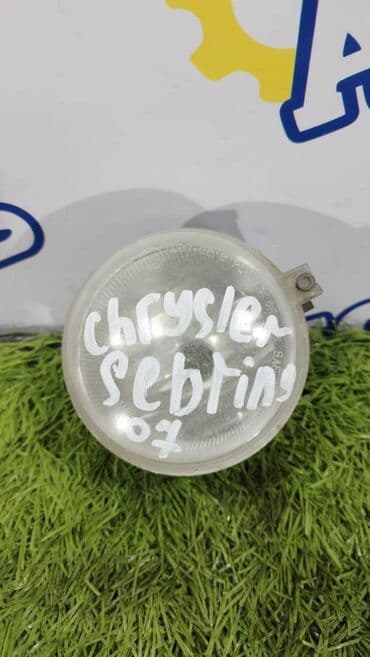 туманка на степ: Левая противотуманная фара Chrysler Б/у, Оригинал — 1