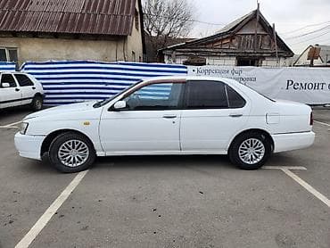 diska 14: Nissan Bluebird: 1997 г., Автомат, Бензин, Седан — 6