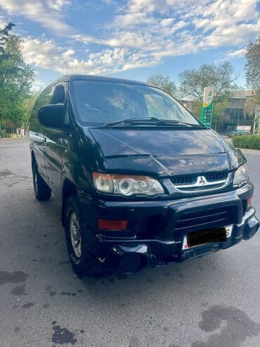 мицубиси делика левый руль бу купить: Mitsubishi Delica: 2002 г., 3 л, Автоматические, Бензин, Минивэн — 7