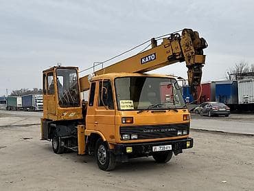 цистерну 16 кубов: Автокран, Nissan, 1994 г., 21 м — 2
