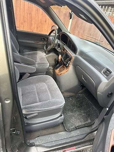 sienna сиенна: Kia Carnival: 2002 г., 2.2 л, Автомат, Бензин, Минивэн — 3